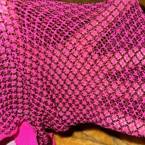 Pink and black fishnet tights